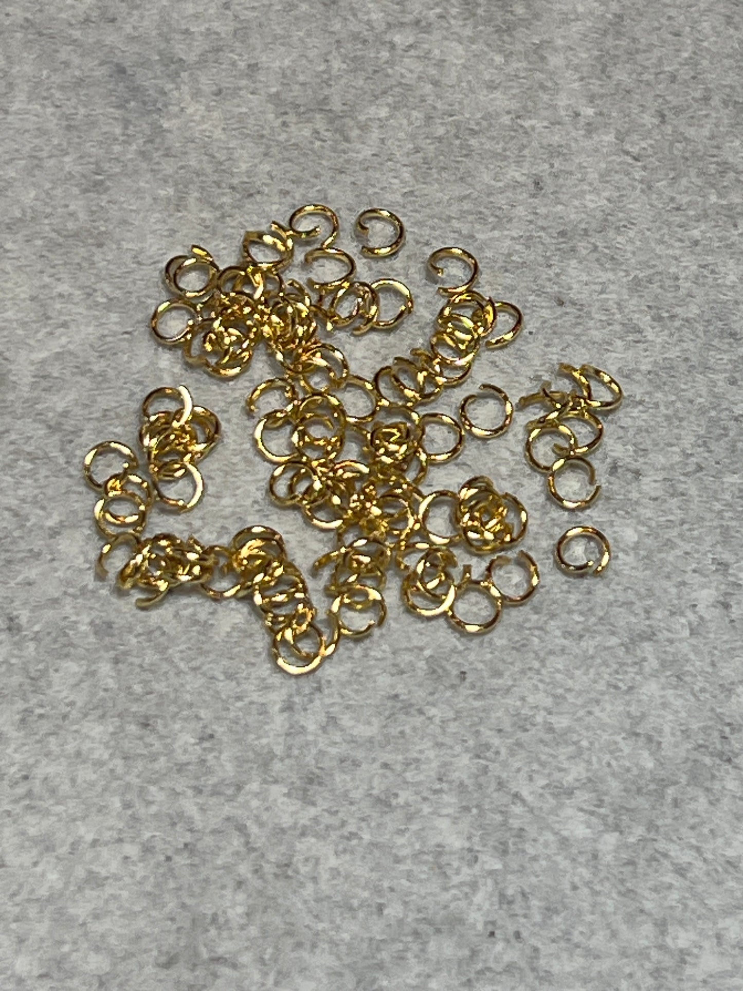 約100個 丸カン ステンレススチール18KGP 4mm 線0.6mm