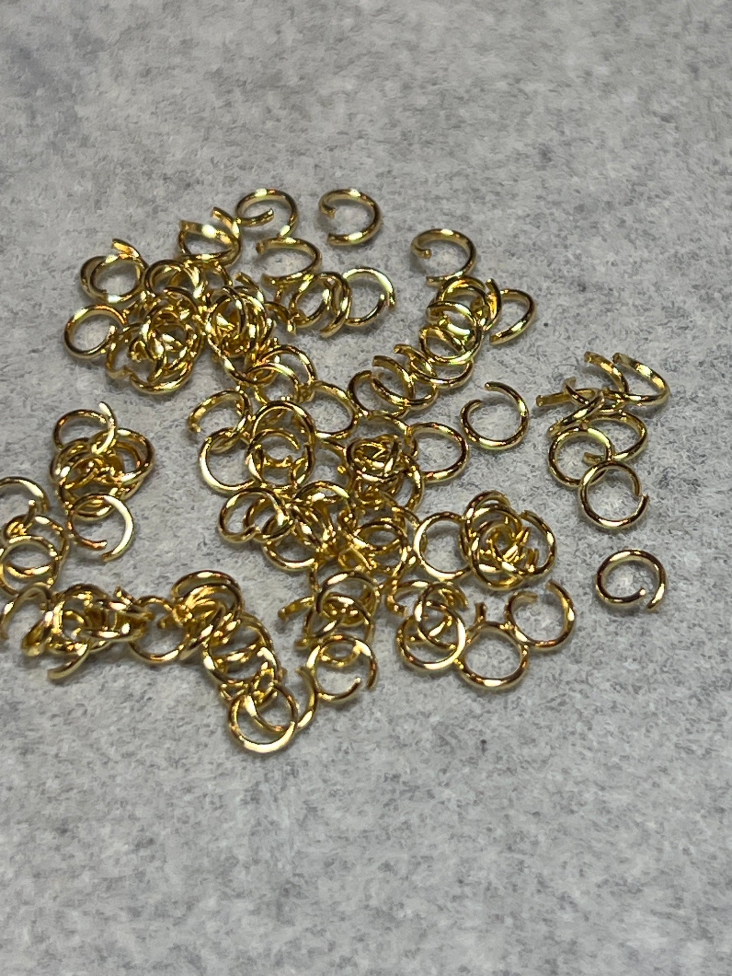 約100個 丸カン ステンレススチール18KGP 4mm 線0.6mm